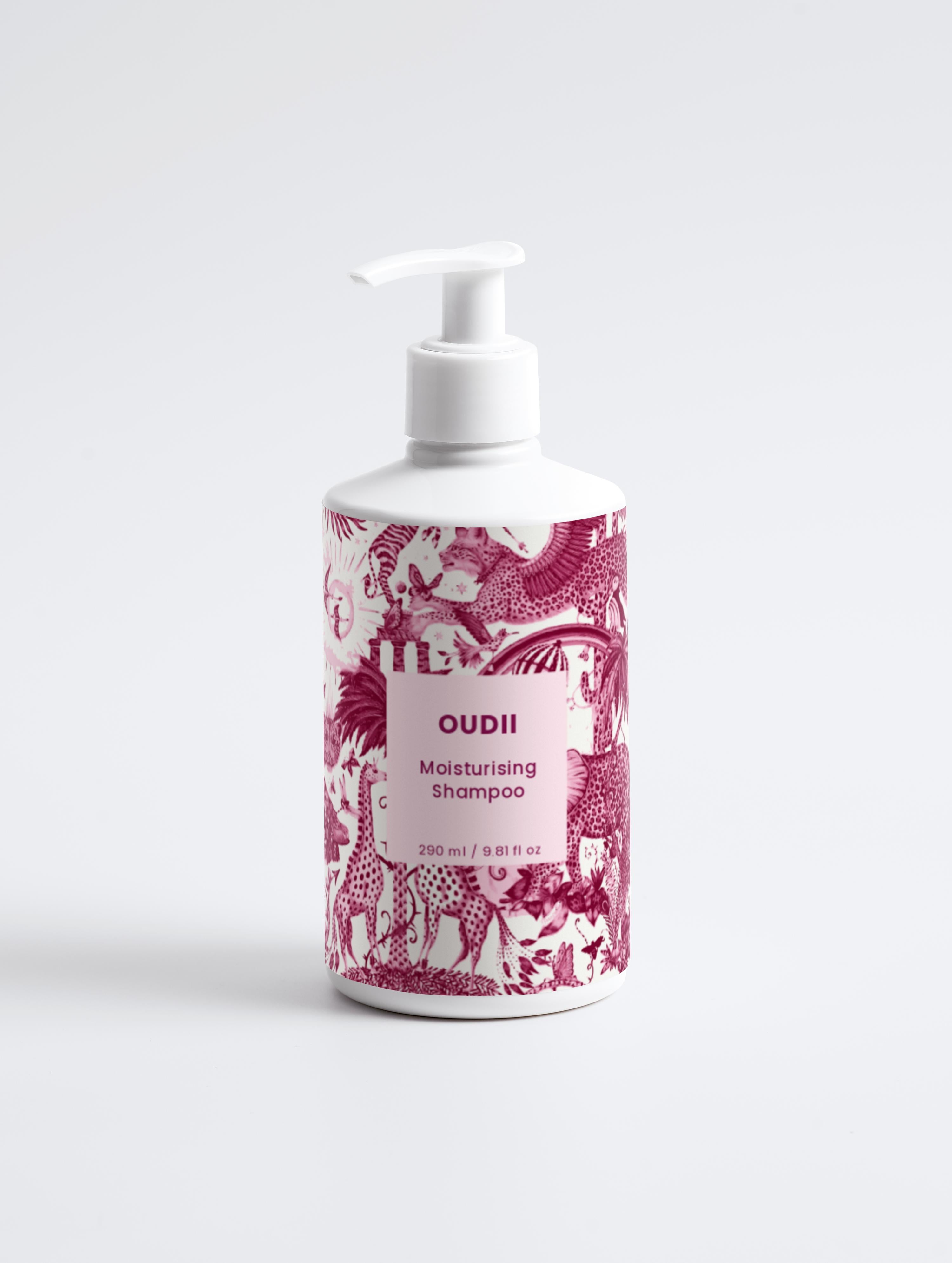 Oudii Shampoo bottle with pink and white design on a white background